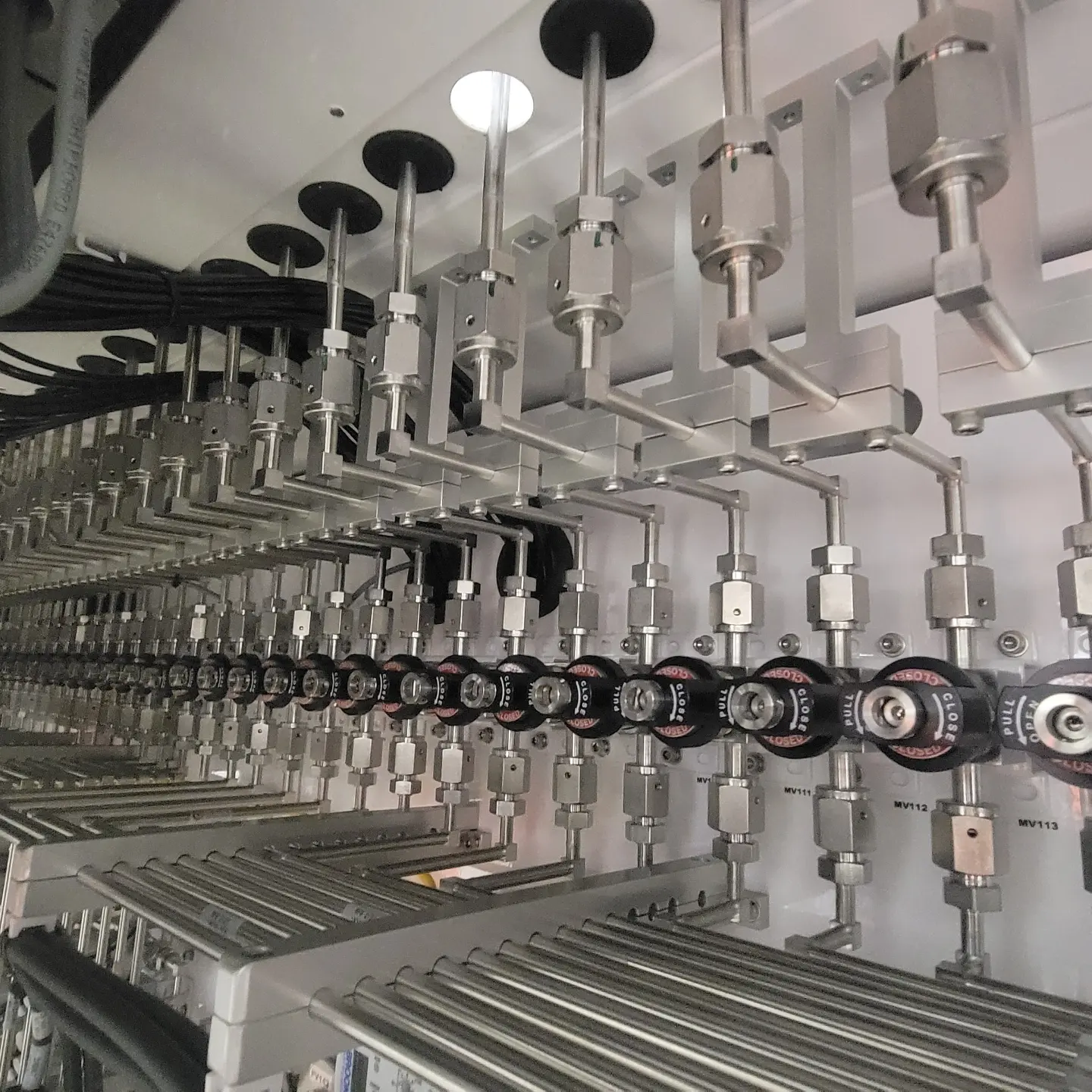 Installed process tubing with rows of valves and fittings