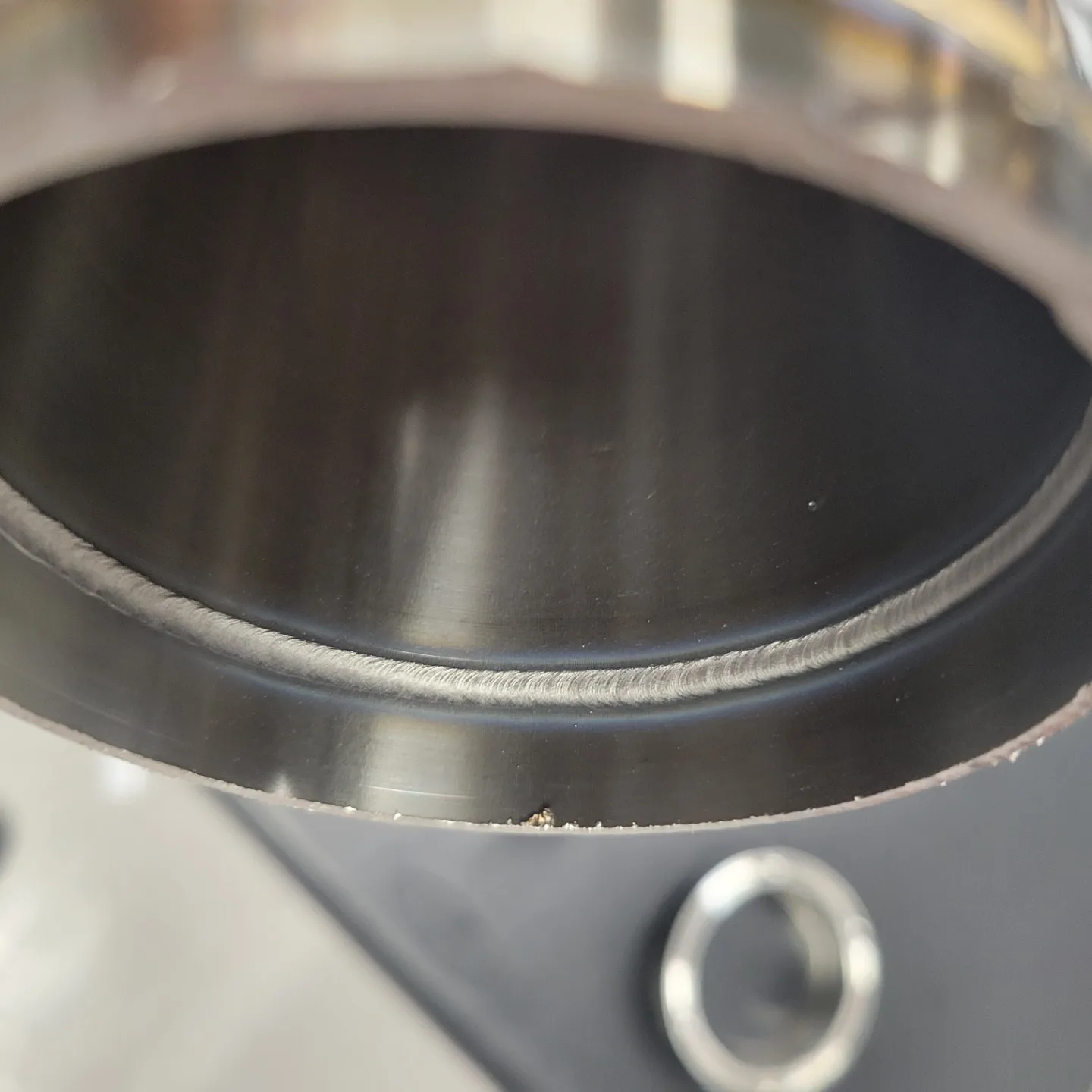 Weld seam around the inside of an open metal tube